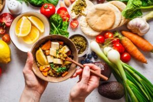 a table full of colorful vegatables