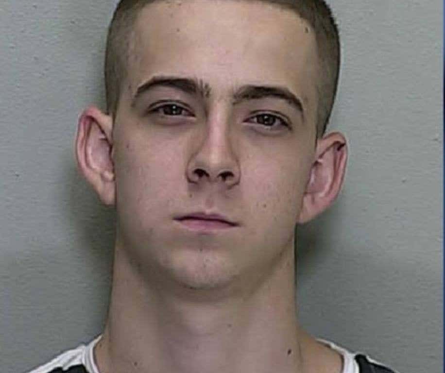 Mugshot of our Bizarre Florida man, Justin Goodreau.