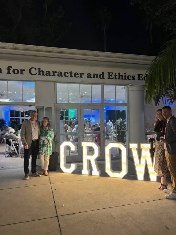 Giant letters spelling CROW, glowing with LED lights