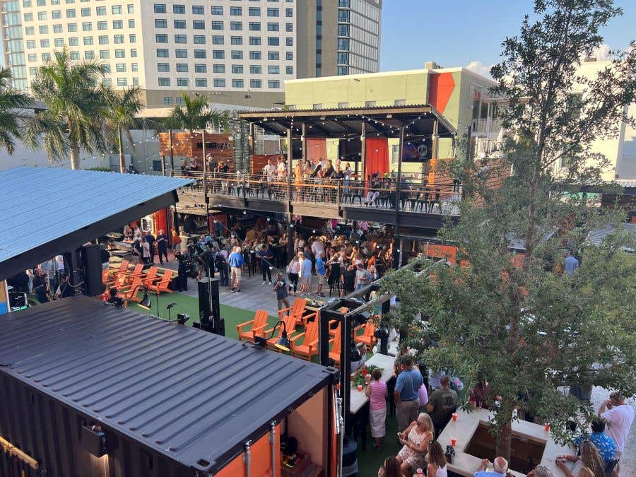 Overhead shot of people outside of new downtown Fort Myers food truck park