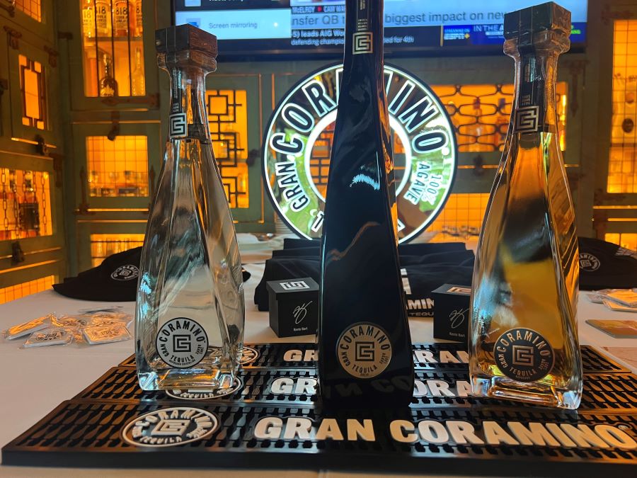 Three Gran Coramino tequila bottles on a table