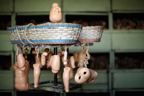 The Sydney Doll Hospital Centenary Meanwhile, a naked Florida woman was arrested after she showed up naked to her neighbor's birthday party, waving plastic doll legs and blaming the heat.