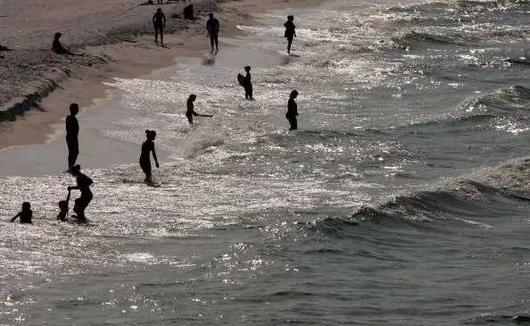 Holiday Sunbathers Wary After Florida Panhandle Shark Attacks