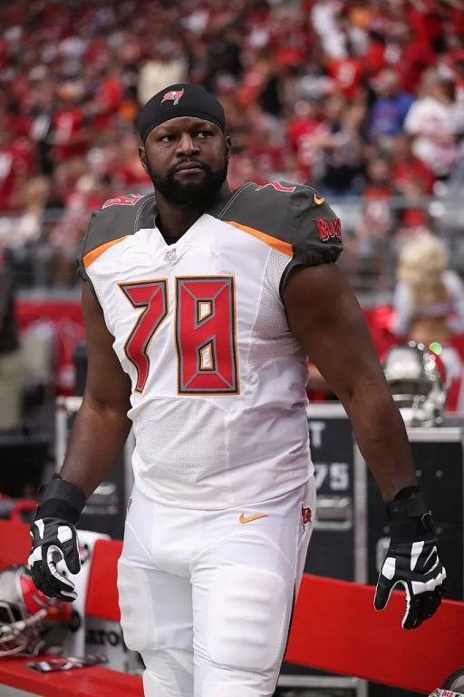 Former Tampa Bay Buccaneer Tackle Gosder Cherilus #78 of the Tampa Bay Buccaneers on the sidelines during the NFL game against the Arizona Cardinals at the University of Phoenix Stadium on September 18, 2016 in Glendale, Arizona. The Cardinals defeated the Buccaneers 40-7.