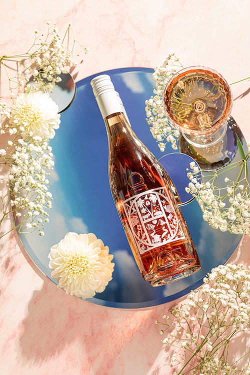 Halter Ranch Effervescent Rosé in beach sand