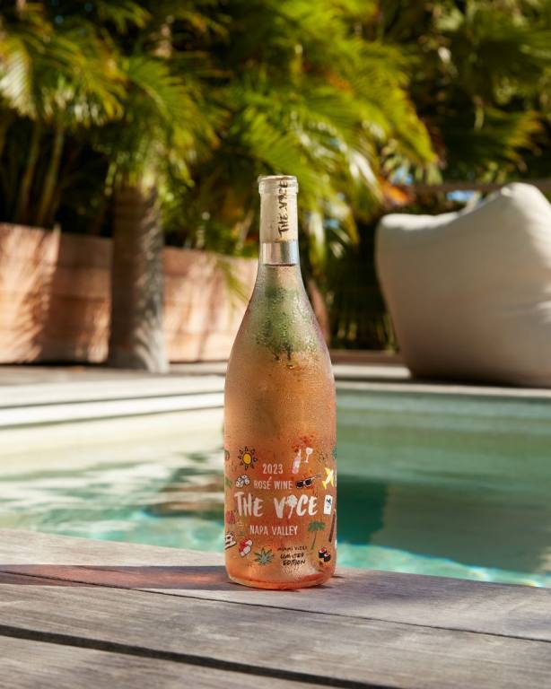 Bottle of Miami Vices Rose by the pool