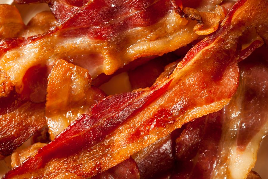 close up of a stack of cooked bacon