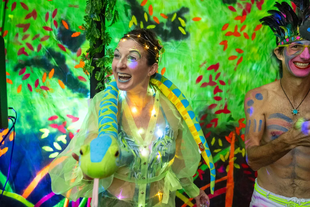 Heather May Sloan gets into the glow-mosphere during the 2023 LUV2GLOW black-light dance party. This year’s LUV2GLOW will take place Wed., Oct 23 at Rick’s Upstairs at the Rick’s Entertainment Complex. (Photo Nick Doll/FantasyFest.com)