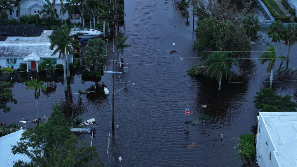 In this aerial view, Flood waters inundate a neighborhood after Hurricane Milton came ashore on October 10, 2024, in Punta Gorda, Florida. The storm made landfall as a Category 3 hurricane in the Siesta Key area of Florida, causing damage and flooding throughout Central Florida.