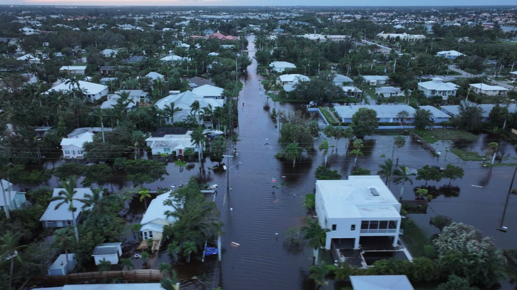 In this aerial view, Flood waters inundate a neighborhood after Hurricane Milton came ashore on October 10, 2024, in Punta Gorda, Florida. The storm made landfall as a Category 3 hurricane in the Siesta Key area of Florida, causing damage and flooding throughout Central Florida.