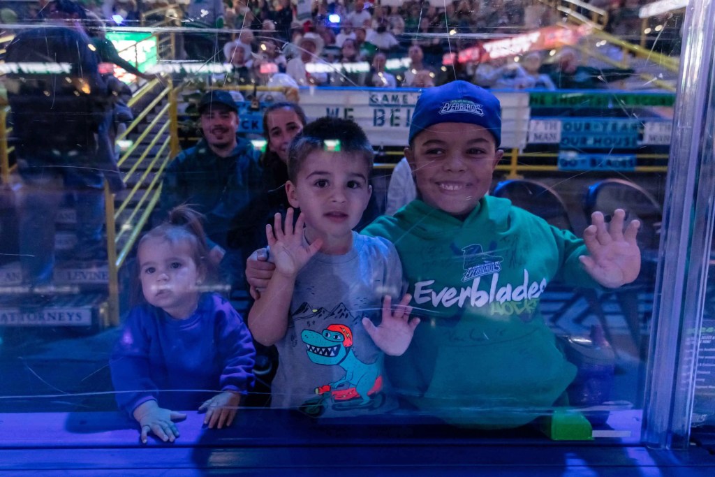 Young Everblades fans cheering.